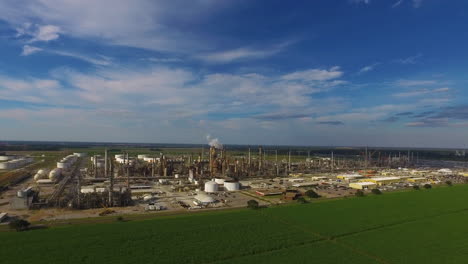 An-aerial-over-an-industrial-oil-refinery-in-an-area-of-natural-beauty