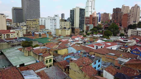Beautiful-aerial-establishing-shot-of-old-buildings-modern-skyscrapers-and-neighborhoods-in-downtown-Bogota-Colombia