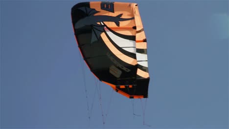 People-engage-in-the-fast-moving-sport-kite-boarding--along-a-sunny-coast-5