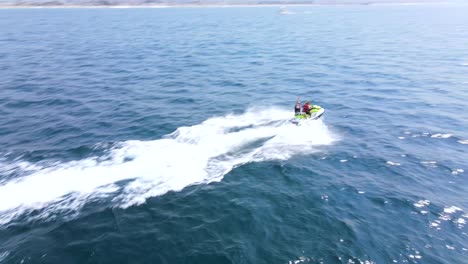 An-Excellent-Aerial-Shot-Of-A-Couple-Jet-Skiing-Together