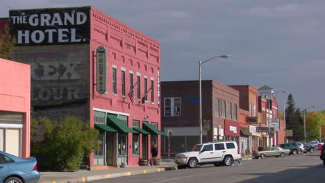 People-Walk-Along-A-Street-In-A-Quaint-Western-Town-1