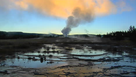 A-Geyser-Sends-Steam-Into-The-Sky-At-Yellowstone-National-Park-1