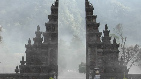 The-Fog-Drifts-By-A-Traditional-Balinese-Temple-Gate-In-Bali-Indonesia-1