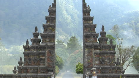 The-Fog-Drifts-By-A-Traditional-Balinese-Temple-Gate-In-Bali-Indonesia-2