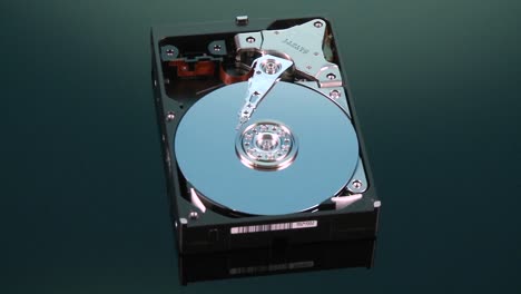 Hard-drive-without-cover-spins-slowly-around