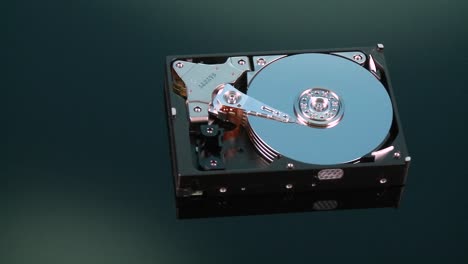 A-hard-drive-with-out-its-cover-pans-by