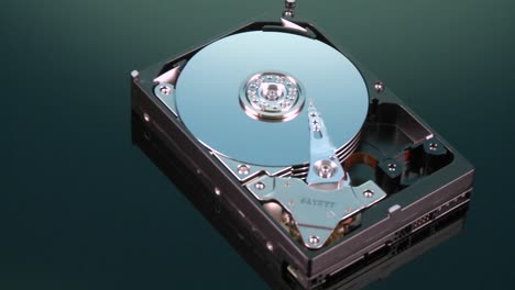 A-closeup-zoom-image-of-a-hard-drive-for-a-computer-is-displayed