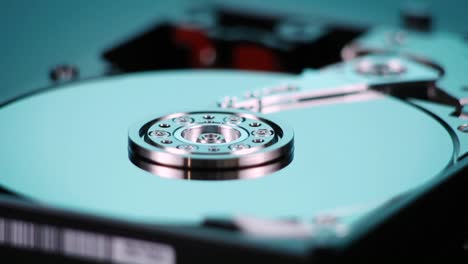A-hard-drive-with-out-cover-spins-slowly-on-display