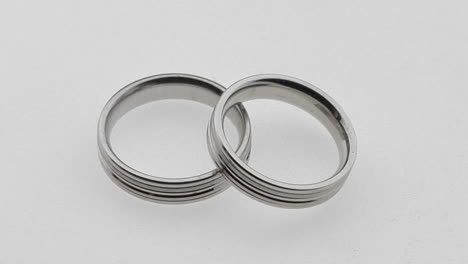 -silver-wedding-rings-overlap-each-other
