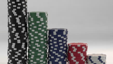 Stacks-of-poker-chips-sit-in-a-row-arranged-by-value-1