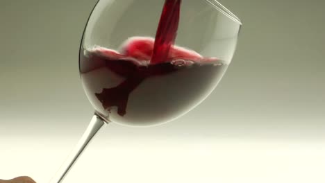 Red-wine-is-poured-into-a-goblet-1