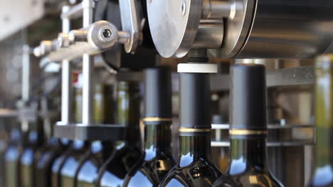 Close-up-shots-of-automation-along-the-assembly-line-inside-a-wine-bottling-factory