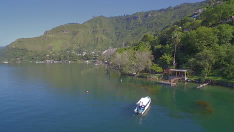 Aerial-along-the-shoreline-of-Lake-Amatitlan-in-Guatemala