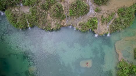 An-aerial-over-remarkable-waterfalls-and-green-polls-on-the-Semuc-Champey-river-in-Guatemala-5