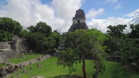 Great-aerial-shot-over-the-Tikal-pyramids-in-Guatemala-12
