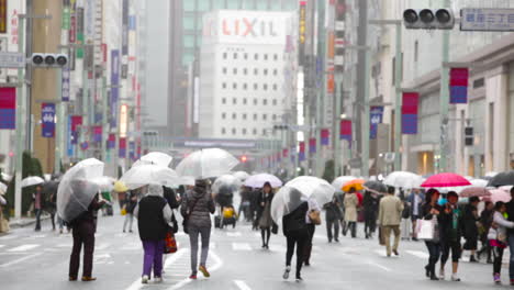 People-walk-on-the-rainy-streets-of-Shanghai-China-1
