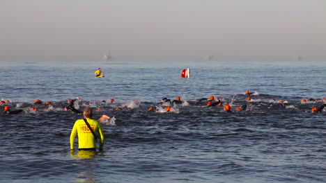 Triathlon-swimmers-swim-in-the-ocean-1