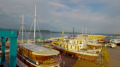 Aerial-over-a-dock-with-fishing-boats-in-dry-dock-in-Croatia