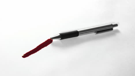Zeitraffer-Eines-Stiftes,-Der-Rote-Tinte-Blutet-1