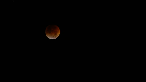 Time-lapse-of-a-lunar-eclipse-with-moon-moving-across-frame-1