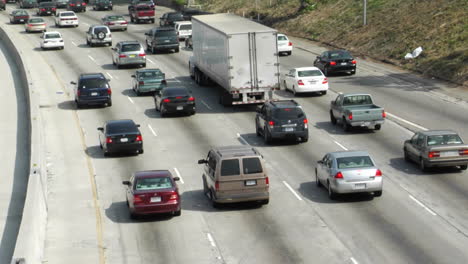 Traffic-moves-slowly-along-a-busy-freeway-in-Los-Angeles-1