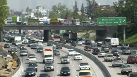 Traffic-moves-slowly-along-a-busy-freeway