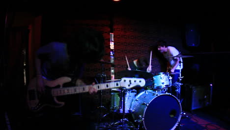 Selective-focus-view-of-a-band-performing-in-a-small-venue