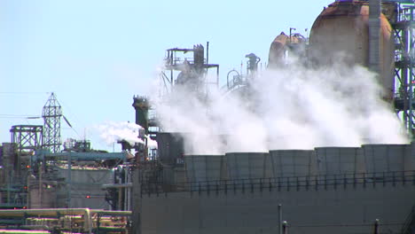 Steam-rises-from-evaporative-stacks-at-a-power-facility