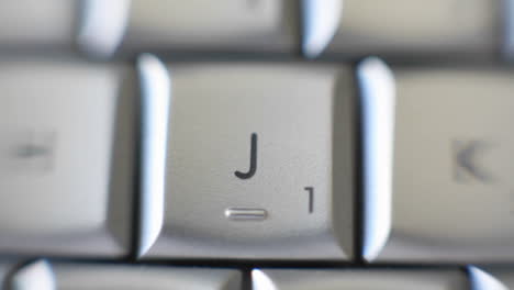 Zoom-Auf-J-Buchstabe-Auf-Einer-Tastatur