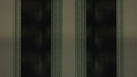 A-strip-of-film-runs-vertically-1