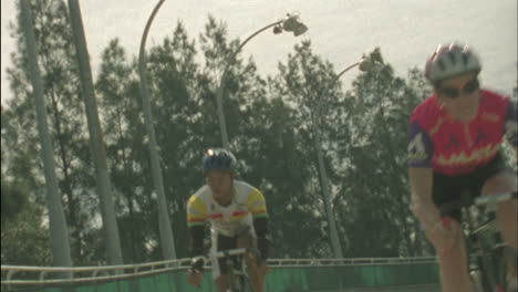Bicyclists-compete-on-a-circuit-track-1