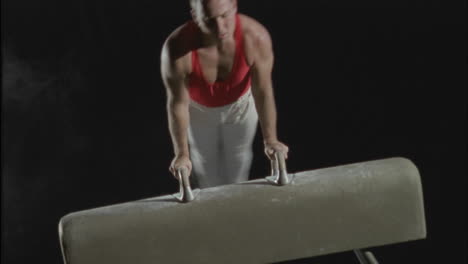 A-gymnast-performs-flairs-on-the-pommel-horse