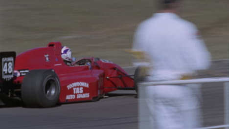 Formula-cars-race-on-a-circuit-track