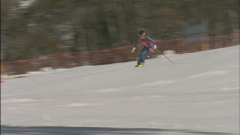 A-skier-skis-downhill-as-spectators-watch