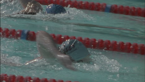 Swimmers-swim-across-the-pool-turn-and-swim-back
