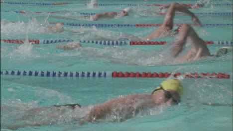 Competitive-swimmers-race-across-a-pool