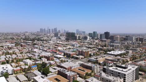 Rising-Aerial-From-Middle-Class-Area-Near-Hollywood-California-With-Downtown-Los-Angeles-In-Distance-2