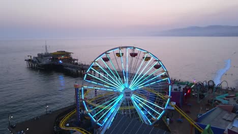 Vista-Aérea-Of-The-Santa-Monica-Pier-And-Ferris-Wheel-At-Night-Or-Dusk-Luz-Los-Angeles-California-2