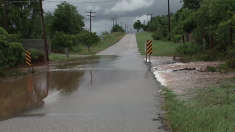 A-Country-Road-Is-Washed-Out-By-A-Rainstorm