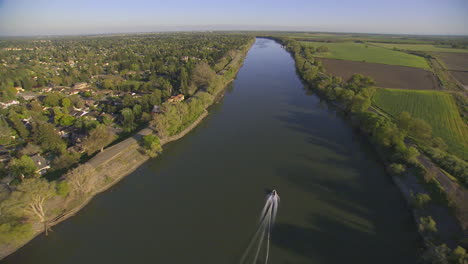 Aerial-Over-A-Boat-On-The-Sacramento-Or-American-River-In-California
