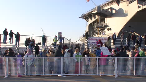 Navy-Families-Welcome-Home-Servicemen-From-An-Aircraft-Carrier