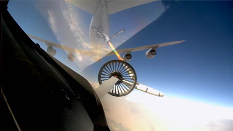 Pov-Shots-From-The-Cockpit-Of-A-Fighter-Plane-As-It-Is-Refueled-In-Midair