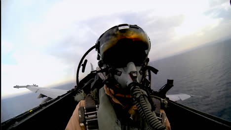 Pov-Shot-Of-A-Fighter-Jet-Landing-On-An-Aircraft-Carrier