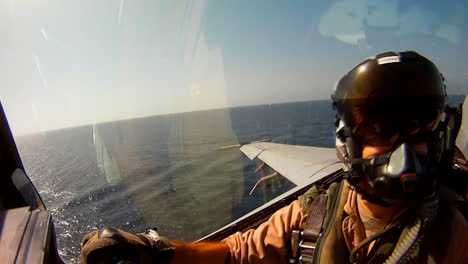 Pov-Shot-Of-A-Fighter-Jet-Landing-On-An-Aircraft-Carrier-3