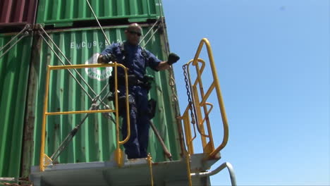 Agents-From-Us-Customs-At-The-Port-Of-Long-Beach-Board-A-Ship-To-Inspect-Cargo-1