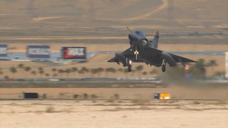 Fighter-Jets-From-The-United-Arab-Emirates-Land-On-A-Runway-At-An-Airbase