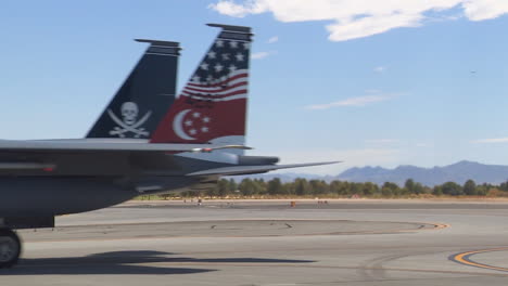 F15-And-F16-Fighter-Jets-Line-Up-And-Taxi-For-Takeoff-In-A-Military-Exercise-5