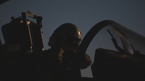 A-Female-Pilot-Dons-Her-Helmet-In-A-Jet-Fighter