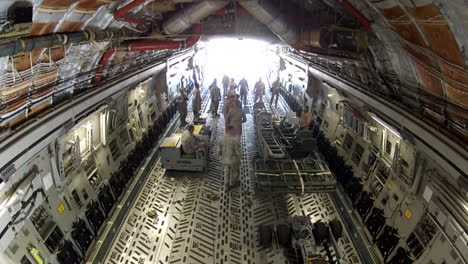 Time-Lapse-Of-Activities-In-The-Cargo-Bay-Of-A-Military-Cargo-Plane