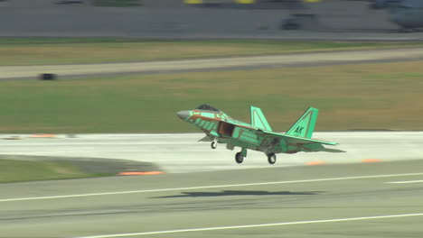 Green-Camouflaged-F15-Jet-Aircraft-Taking-Off-From-A-Military-Base-1